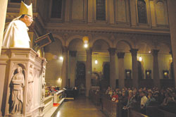 Archbishop Daniel M. Buechlein preaches during a Nov. 29 Mass at St. Joan of Arc Church in the Indianapolis North Deanery. The Mass was the first of a series of 11 deanery Masses to celebrate the canonization of St. Theodora Guérin.