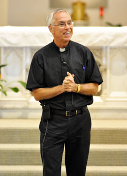 Father Todd Riebe speaks on Aug. 17, 2011, at St. Andrew Church in Richmond to archdiocesan seminarians who were on a pilgrimage to the three parishes in the eastern Indiana city. Father Riebe is the pastor of the Richmond Catholic Community made up of the parishes of Holy Family, St. Andrew and St. Mary. (File photo by Sean Gallagher)