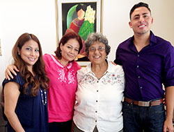 The staff at the Hispanic Connection in Jeffersonville pose in their new office on Sept. 4. Pictured are Hilda Tiller, left, a paralegal student at Indiana University Southeast in New Albany and client advocate; Olga Oliva, receptionist; Lillian Rose, director; and Juan Chavez, office manager. (Photo by Leslie Lynch)