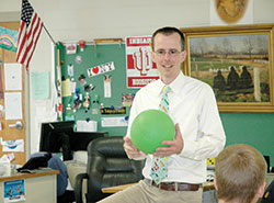 Doug Bauman tries to influence his students at St. Barnabas School in Indianapolis by sharing his faith and emphasizing service. (Photo by John Shaughnessy)