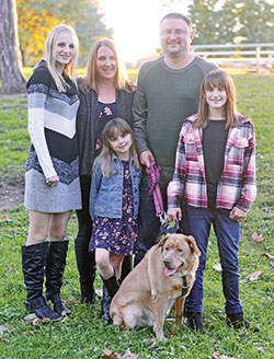 Nick and Jennifer Vermillion pose with their children Isabelle, Alexis and Evelynn, all three of whom attend Our Lady of the Greenwood School in Greenwood thanks to the Indiana school choice voucher program. (Submitted photo)