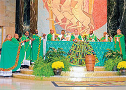 Priests from across the country concelebrate with Archbishop Charles C. Thompson on Oct. 15 in St. Rita Church in Indianapolis during the closing Mass of the National Black Catholic Men’s Conference. (Photo by Natalie Hoefer)